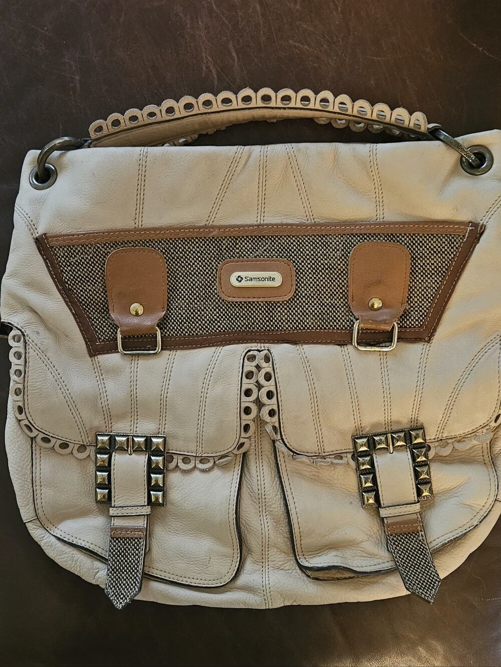 Betsey Johnson cream and brown satchel with studded buckles